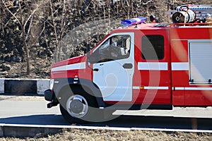 Special freight transport on the road. The fema car or fire service is on the road. photo