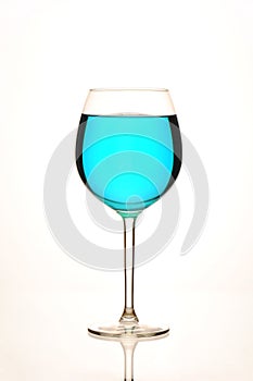 special full blue wine glass on a white background
