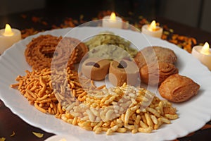 Indian Tasty Mix Snacks Plate. Mixed food. Traditional India tasty snacks. Season of festivals.