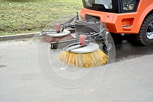 A special machine sweeps city paths