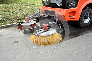 A special machine sweeps city paths