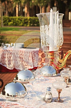 Special occasion table setting in a luxury outdoor restaurant