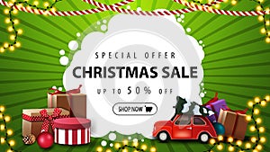 Special offer, Christmas sale, up to 50% off, green and white banner with presents, garland and red vintage car