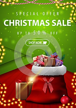 Special offer, Christmas sale, up to 50% off, vertical red and green discount banner in material design style with Santa Claus bag
