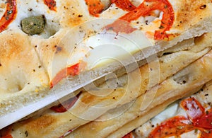 special pizza made in Liguria Italian Region called Focaccia