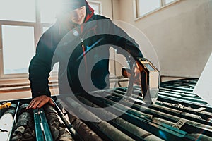 A special team of geologists who study rocks in industry using modern machines.Selective focus