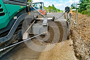 special technique for leveling the ground is on the road when repairing road works