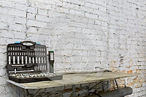 Special tools auto mechanic. In the box. Standing on the table.