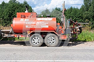 Special vehicles of the road service are parked on the side of the road. Road works. Kuvshinovo  Tver oblast.