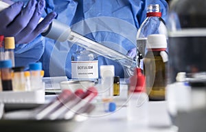 Specialist analyzes botulism Samples in laboratory