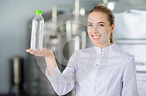 Specialist with bottle of pure water