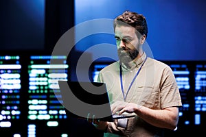 Specialist doing server farm maintenance