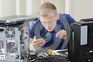 IT specialist installing ram memory