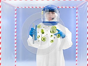 Specialist in protective suit holding biological sample