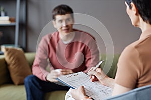 Specialist talking to patient at session