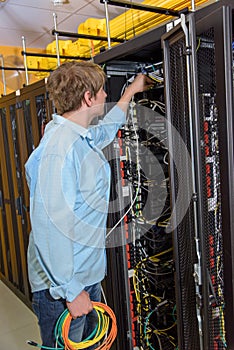 IT specialist working in datacenter