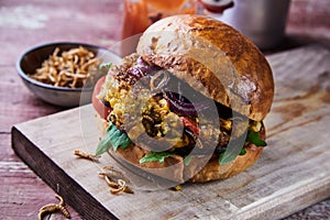 Speciality gourmet fried mealworm insect burger