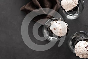 Speciality Italian stracciatella ice cream scoop with flakes of dark chocolate in a creamy vanilla ice-cream. Top view.