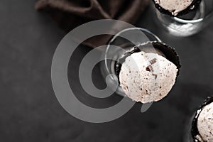 Speciality Italian stracciatella ice cream scoop with flakes of dark chocolate in a creamy vanilla ice-cream. Top view.