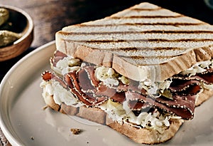 Speciality peppered beef pastrami sandwich