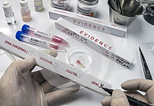 Specialized criminal police check box for oral DNA evidence in an evidence box photo