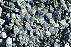 Speckled peeblestones surface as natural background