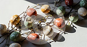Speckled spring Easter eggs and willow branches