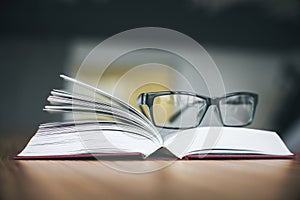 Specs and open book