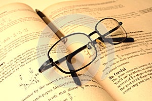 Spectacle and a book photo