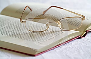 Spectacles and Book photo