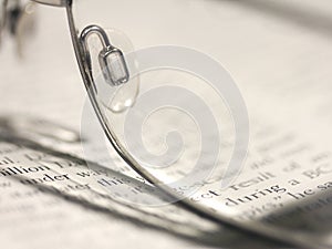 Spectacles on book