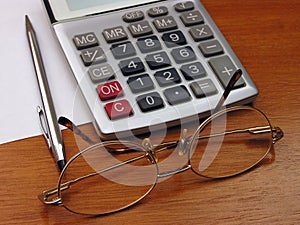 Spectacles and calculator