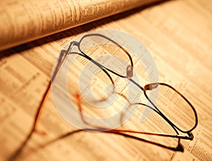 Spectacles on financial page
