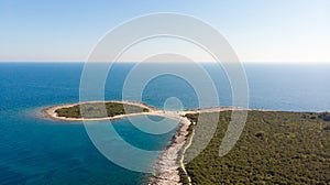 Spectacular aerial sea landscape of rocky coast and crystal clear water.