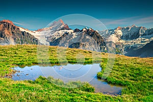 Spectacular alpine lake and snowy mountains, Grindelwald, Switzerland, Europe