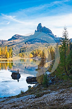 Spectacular autumn landscape of an alpine lake in the Dolomites