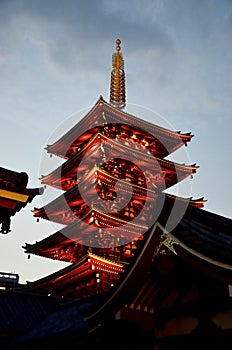 The spectacular Buddhist temple of Sensoji in Asakusa illuminated in the evening.
