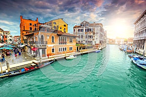 Spectacular canal with markets, shops, gondolas in Venice, Italy, Europe