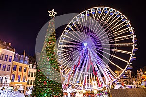 Spectacular Christmas tree and carousel in amazing Bruges Belgium