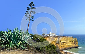 Spectacular cliffs on Senhora Da Rocha Nova Beach