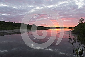 Spectacular cloudy sunrise on the LÃ©on-Provancher marsh during springtime