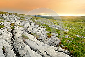 Spectacular landscape of the Burren region of County Clare, Ireland. Exposed karst limestone bedrock at the Burren National Park photo