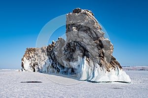 Spectacular landscape of the Dragon tail rock located at Ogoy island in frozen lake Baikal in winter season.