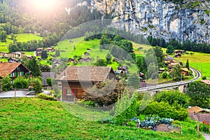 Spectacular Lauterbrunnen town with high cliffs, Bernese Oberland, Switzerland, Europe