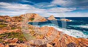 Spectacular morning view of Pietra cape with Phare de la Pietra lighthouse on background.