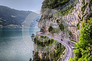 The spectacular motorway on the cliff at the Thun Lake