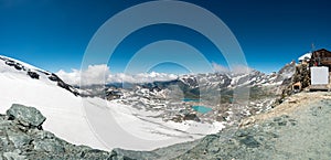 Spectacular mountain panorama with glaciers running towards valley on a sunny day.