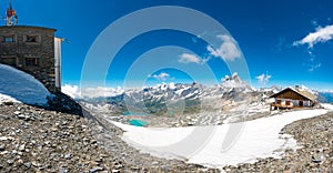 Spectacular mountain panorama with glaciers running towards valley on a sunny day.