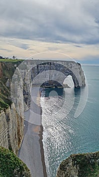 Spectacular natural cliffs Aval of Etretat and beautiful famous coastline, Normandy, France