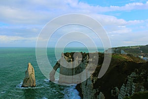 Spectacular natural cliffs Aval of Etretat and beautiful famous coastline, Normandy, France, Europe